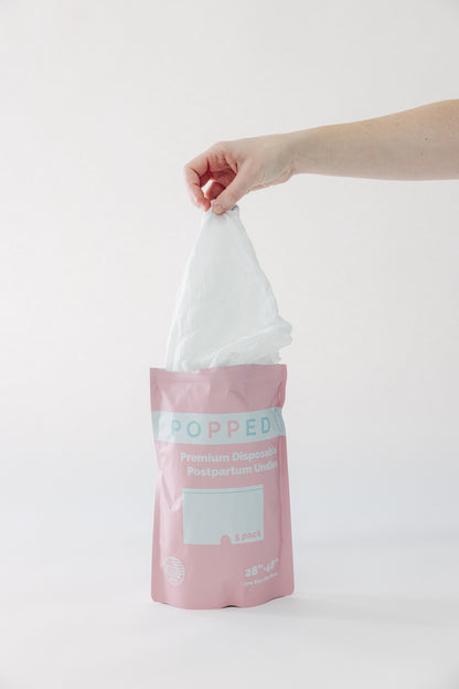 The Tush Premium Survival Bundle featuring clinical-grade support for the fourth trimester. Popped disposable postpartum underwear.